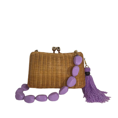 Light Honey
Bag: 100% wicker
Lining: 100% polyester
8.3”L x 2.8”W x 5.5”H
Rounded clasp in metal plated gold 18k;
Magnetic closure
Beaded tassel
With two detachable straps: beaded and a crossbody in caramel leather
Light Honey Crystal
Bag: 100% wicker
Lining: 100% PVC
8.3”L x 2.8”W x 5.5”H
Rounded clasp in metal plated gold 18k
Magnetic closure;
With two detachable straps: crystal strap and a crossbody in caramel leather