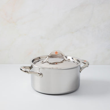 A quality soup pot is an opportunity for your creativity (and fridge veggie drawer) to run wild: make a flavorful soffritto base, add any seasonal vegetables that take your fancy, top with water or light stock and simmer until perfectly cooked - finish with fresh aromatic herbs, and enjoy as-is or puree for a velvety, satisfying creaminess. Made with best-in-class clad stainless steel: a thick core of super conductive aluminum alloy guarantees great responsiveness, ensuring food will not burn or overcook. The inside is lined in mirror-polished stainless steel, practical and easy to clean, whilst the external stainless steel layer is hammered by our master artisans to ensure lasting beauty. The handles, comfortable yet elegant, are inlaid with the signature Ruffoni copper coin. Induction compatible. Made in Italy. 3.5qt Fulfilled by our friends at Ruffoni *Please Note: Rewards cannot be applied to this product This item is not eligible for returns