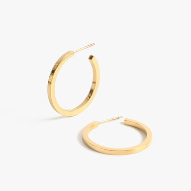 Meet your new best friend. Our most delicate geometric hoop to date is now available in a perfectly polished version. Intricately detailed to make a big statement yet light enough to wear all day long, these beautifully crafted hoops are a must-add to your accessories collection. Available in 1" + 2" + 3" diameters — the Jay Hoops are named after the designer's sister and fashion muse with her iconic effortlessly sophisticated fashion aesthetic. Fit for every single occasion, from every day wear to formal events, this hoop is made for the It Girl on the go.
Signature customer MC earring backings for extra comfort and security
Post-back closure — for pierced ears
1" diameter
Fulfilled by our friends at MARRIN COSTELLO
*Please Note:
Rewards cannot be applied to this product
This item is not eligible for returns
This item cannot be shipped outside the U.S.