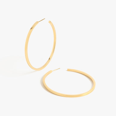 Meet your new best friend. Our most delicate geometric hoop to date is now available in a perfectly polished version. Intricately detailed to make a big statement yet light enough to wear all day long, these beautifully crafted hoops are a must-add to your accessories collection. Available in 1" + 2" + 3" diameters — the Jay Hoops are named after the designer's sister and fashion muse with her iconic effortlessly sophisticated fashion aesthetic. Fit for every single occasion, from every day wear to formal events, this hoop is made for the It Girl on the go.
Signature customer MC earring backings for extra comfort and security
Post-back closure — for pierced ears
2" diameter
Fulfilled by our friends at MARRIN COSTELLO
*Please Note:
Rewards cannot be applied to this product
This item is not eligible for returns
This item cannot be shipped outside the U.S.