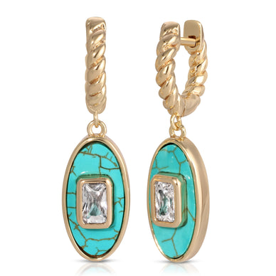 A cz baguette swimming in a sea of truly gorgeous turquoise 14k gold plated over brass drop earrings with genuine turquoise and cz baguette accent Fulfilled by our friends at Leeada *Please Note: This item is not eligible for returns This item cannot be shipped outside the U.S.