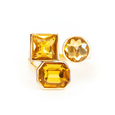 One size fits all! Three’s a party with our fun and fabulous Multi-Stone Adjustable Ring in Honey. Crafted with a flexible band for various sizing, this piece can be worn on any finger for optimal wow factor. Adjustable 14K Gold plating over brass with swarovski stones Fulfilled by our friends at Short & Suite *Please Note: Rewards cannot be applied to this product This item is not eligible for returns This item cannot be shipped outside the U.S.