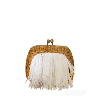  Honey with White  

Bag: 100% wicker
Lining: 100% polyester
7.8”L x 2.3”W x 5.9”H
Rounded  clasp  in metal plated gold 18k
Magnetic closure
Ostrich feather Applied
Detachable crossbody in caramel leather

 