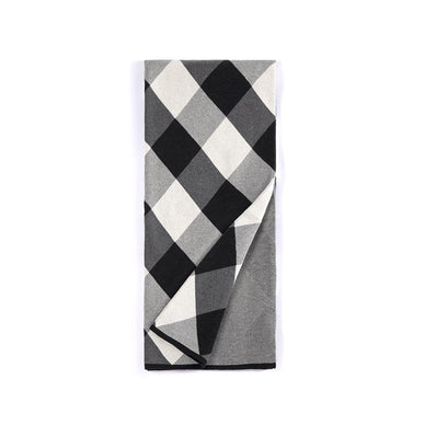 Snuggle up near the fire and listen to your favorite classics in Shiraleah’s Anderson Throw blanket. This throw features a timeless black, white, and gray plaid print on one side and is solid gray on the other. Not only will this blanket keep you warm and add style to your home, but it comes ribbon wrapped making it a great gift option. Pair with other items from Shiraleah’s home collection to complete your look! 

Black
L 60" X W 50"
Cotton
India
Belly Band
28-12-002

Fulfilled by our friends at Shiraleah 
*Please Note: 

Rewards cannot be applied to this product
This item is not eligible for returns 
This item cannot be shipped outside the U.S.
