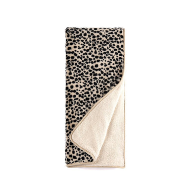 Bring warmth and grace to your home with Shiraleah’s Astin Throw. This blanket features a black spotted print hosted on an ivory background making it glamorous yet sophisticated. This throw has a luxurious faux fur texture and ribbon wrapped packaging making it a perfect gift option. Pair with other items from Shiraleah’s home collection to complete your look! 

Black
L 60" X W 50"
Polyester
China
Belly Band
28-21-001

Fulfilled by our friends at Shiraleah 
*Please Note: Rewards cannot be applied to this product This item is not eligible for returns 