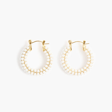 Fulfilled by our friends at Marrin Costello 
The It Hoop for girls that get it — meet our second edition of the Audrey Collection, detailed with ivory glass pearls. Available in both Hoop and Huggie sizes, this clickhoop earring is the statement you never knew you couldn't live without. Small in diameter but big in statement — Audrey is light (and small) enough to wear every single day, and yet sophisticated enough to rock with formal attire. Named one part for Ms. Hepburn herself and two part for Ms. Audrey Hope, the designer's soul coach and guest on Season 1 of the Marrin Costello Radio podcast — the Audrey's are stunning just as much as they are meaningful. From brunch to prom to bridal galore and everything in between — this hoop is not a want but a need. 


 Click-back closure — for pierced ears

1" diameter

*Please Note: 

Rewards cannot be applied to this product
This item is not eligible for returns 
This item cannot be shipped outside the U.S.

 