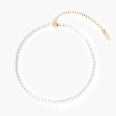 Fulfilled by our friends at Marrin Costello 
As the newest addition to our beaded choker series — the Augusta Choker will make you feel like royalty. A layer-friendly must-have featuring 12” of 4mm ivory glass beads strung on delicate round link chain, this piece also comes with a built-in extender, making it one of the most versatile pieces you will have in your jewelry collection. Gorgeous on its own, and perfect for layering, the Augusta Choker adds just the right amount of classic sophistication to any necklace stack. Designer Tip: pair this piece with the Crown Choker and/or Regina Lariat for a vintage-inspired trendy look that is sure to turn heads! 

12" length + 3.5" extender
Lobster clasp closure

*Please Note: 

Rewards cannot be applied to this product
This item is not eligible for returns 
This item cannot be shipped outside the U.S.
