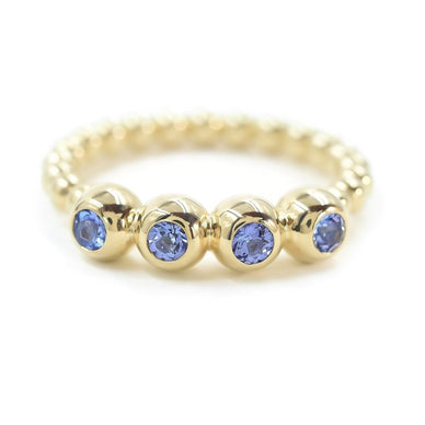 Emani Ring, Tanzanite, 14K Yellow Gold 
Fulfilled by our friends at BONDEYE JEWELRY ® 
*Please Note: 

Rewards cannot be applied to this product
This item is not eligible for returns 
This item cannot be shipped outside the U.S.
