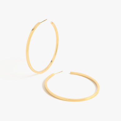 Meet your new best friend. Our most delicate geometric hoop to date is now available in a perfectly polished version. Intricately detailed to make a big statement yet light enough to wear all day long, these beautifully crafted hoops are a must-add to your accessories collection. Available in 1" + 2" + 3" diameters — the Jay Hoops are named after the designer's sister and fashion muse with her iconic effortlessly sophisticated fashion aesthetic. Fit for every single occasion, from every day wear to formal events, this hoop is made for the It Girl on the go. 
  

Signature customer MC earring backings for extra comfort and security 
Post-back closure — for pierced ears 
2" diameter

Fulfilled by our friends at MARRIN COSTELLO 
*Please Note: 

Rewards cannot be applied to this product
This item is not eligible for returns 
This item cannot be shipped outside the U.S.

