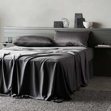 Our silky-soft signature sateen weave is infused with naturally antimicrobial charcoal that’s scientifically proven to keep sheets feeling fresh and smelling cleaner longer. It absorbs unwanted odors and reduces bacteria by 99.9%, while also feeling smooth and comfortable against your skin. Made with our exclusive, sustainable CleanBamboo™ fabric for a restful night’s sleep. Includes a fitted sheet, flat sheet pillowcase(s). 

90% bamboo lyocell, 10% bamboo charcoal
Antimicrobial and antibacterial - this bedding reduces odor causing bacteria by 99%
Cooling effect - breathable weave cools and adjusts for a comfortable sleep
Feels smooth like 1,000 thread count cotton, yet wicks away moisture 50% faster than cotton
Hypoallergenic, free from harmful chemicals and ideal for sensitive skin
STANDARD 100 by OEKO-TEX® SH065 176027 TESTEX 


 Details 

Set includes 1 fitted sheet, 1 flat (top) sheet plus pillowcase(s).* *Full and Queen include 2 standard pillowcases; King and Cal King include 2 king-size pillowcases; Twin and TwinXL include 1 standard pillowcase
Deep pockets stretch to fit both regular and deep pocket mattresses up to 17"
Inside Top/Bottom label makes bed-making easy
Pre-washed and packaged in a reusable drawstring bag made from scrap fabric

 Care 

Machine wash cold on gentle/delicate with like fabrics, tumble dry low or line dry. Avoid bleach. To prevent pilling, avoid fabric softener or dryer balls.
To avoid wrinkles, shake out between wash and dry, and remove immediately after drying, or line dry. Iron low if desired.


Fulfilled by our friends at  ettitude 
*Please Note: 

Rewards cannot be applied to this product
This item is not eligible for returns 
This item cannot be shipped outside the U.S.

  