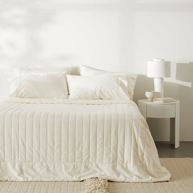 Not the linen you know. Cozy it up and uplift your space with our versatile eco-luxe Linen+ Quilt. Reimagined with our patented CleanBamboo Hemp™, our take on linen is decadently soft and much kinder to the planet. 
Made of a luxurious blend of bamboo and hemp fibers that creates varying depths of color for a unique, elevated look. 

Made of 70% bamboo lyocell, 30% hemp
99.9% antimicrobial so you wake up feeling fresh
No harmful chemicals
Hypoallergenic and gentle on sensitive skin
Fewer wrinkles than flax linen

Details 

Includes one quilt in size of your choice
Size: 50” x 70”
250 GSM
Pre-washed and packaged in a reusable drawstring bag made from fabric scraps

STANDARD 100 by OEKO-TEX® SH065 176027 TESTEX (aka no harmful chemicals)


 
Care 


Machine washable - Wash on cold with mild detergent and like fabrics on a gentle or delicate setting. Line dry or tumble dry low. Avoid bleach or fabric softener. Dry clean optional.


Wrinkle-free - Shake out bedding between washing and drying. Remove immediately after drying, or line dry if preferred. If desired, iron at a low temperature.


Pilling prevention - Some pilling is normal for natural fibers. To prevent excess pilling, avoid fabric softeners, dryer balls, and friction with other rough fabrics.


Fulfilled by our friends at  ettitude 
*Please Note: 

Rewards cannot be applied to this product
This item is not eligible for returns 
This item cannot be shipped outside the U.S.


