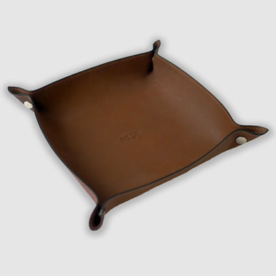 Our sophisticated valet tray in smooth leather is the perfect solution to organize essentials at home or in the office. 
Fulfilled by our friends at Jeff Wan 
*Please Note: 

Rewards cannot be applied to this product
This item is not eligible for returns 
This item cannot be shipped outside the U.S.
