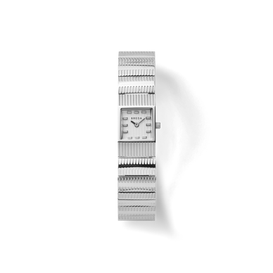 Groove carries a petite 16mm square case and a 16mm bracelet; this timepiece presents a delicate buckle feature and fastens with a jewelry clasp. 
The Groove Collection is inspired by the journey of finding one’s own flow state, a timepiece resembling a continuity between self and other. Each timepiece holds intricate ridges resembling the hills and valleys within our lives, telling a story of ever-unfolding presence and stillness, one that compels the spirit to dig deeper within itself until all aspects of one’s identity intersect harmoniously. 





Fulfilled by our friends at BREDA 
*Please Note: 










Rewards cannot be applied to this product
This item is not eligible for returns 
This item cannot be shipped outside the U.S.





Explore Collection 