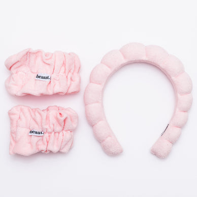 What: Introducing our Bubble Headband and Wristbands Set - the ultimate essential for your skincare and makeup routine 💗 Made from high-quality terrycloth, this set is perfect for keeping your hair out of your face and protecting your arms or clothes from getting drenched during your cleansing or exfoliating routine.  
Colors: Pink, Nude, Blue  Black 
Includes: 1 headband + two wristbands  
Care Instructions: The bubble bands are designed to get messy and are machine washable. To care for your bubble bands, spot clean as needed, place in a garment bag and machine wash on cold, delicates setting preferred. Air dry.  
Materials: Headband: 100% terrycloth. Wristbands exterior: 100% terrycloth. Wristbands interior: 100% elastic 
Fulfilled by our friends at beaut.beautyco. 

*Please Note: 

This item is not eligible for returns 
This item cannot be shipped outside the U.S.
