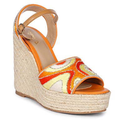 Step confidently into the spotlight with The Marcilia– a uniquely designed wedge that effortlessly transitions from day to night. Crafted with a raffia wedge platform, The Marcilia offers a modern take on classic sophistication as the front features an exquisite wavy motif adorned with meticulously placed embroidery beads, adding a touch of artisanal charm to every step.  





Fulfilled by our friends at FutureBrandsGroup 
*Please Note: 










Rewards cannot be applied to this product
This item is not eligible for returns 
This item cannot be shipped outside the U.S.





