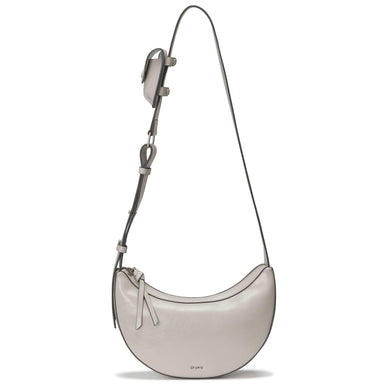 Transport your essentials in style and with ease, thanks to the Rookie Leather Cross- body Bag. With a secure zip-top closure and interior compartment, its strap easily adjusts to shoulder length; a detachable miniature pouch serves as a practical detail. A graceful half-moon silhouette further enhances the look. 
Crafted with meticulous attention to detail and quality, this tote is made to be durable and stylish. The use of high-quality materials ensures that it's not only fashionable but also built to last. 
Material:  Leather Measurement (in) Width: 10 Height : 7 Depth: 3 Strap Length: 32-40 
Fulfilled by our friends at FutureBrandsGroup 
*Please Note: 

Rewards cannot be applied to this product
This item is not eligible for returns 
This item cannot be shipped outside the U.S.

  