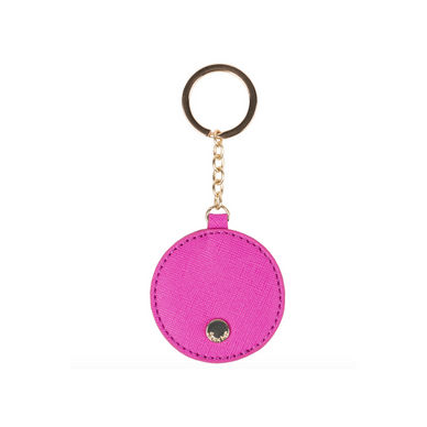 The Annabelle Key Chain is the perfect accessory to your wallet or handbag. - Faux leather construction - Exterior features link key chain - Approx. 2.25" H x 2.25" W - Imported