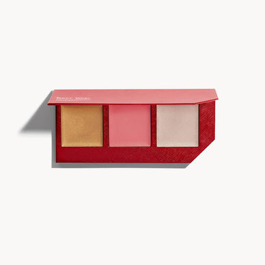 A limited edition, make-up-artist-curated combination of blush and highlighter essentials inspired by summer light and colors. The best-selling, award-winning Certified Organic cream formulas can be effortlessly applied to create sun-kissed cheeks, a natural glow and an elegant bronze. The Cheek Collective holds some of Kjaer Weis’ most beloved shades but also adds new, exclusive shades created by their founder Kirsten to be universally-flattering. The result is sophisticated shade combinations that are versatile and intuitive, allowing every person to make their own.   
The Cheek Collective is housed in a glossy red, leather-feel recyclable and compostable palette. Lightweight and easy to carry, made from textured recyclable paper.  
