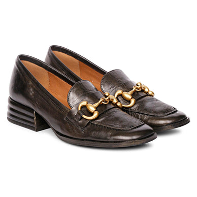 As stylish as they are cute, a timeless leather handcrafted shoe that'll definitely add some class to your outfits. This fashionable loafer features either a leather or suede upper with a chunky heel and buckle detailing. The shoe has the unique Horsebit ornaments on it which give it a classic feel. Complete with breathable PU leather lining, a breathable padded insole, and a black tunit sole. These can be stylishly worn outdoors and indoors.Strike the perfect balance of style and comfort with this pair of mules from Saint G.a decorative leather-covered low stacked block heel with contrasting trim completes the look. 

Brand: Saint G
Color: Black
Closure: Slip On
Upper: Black Leather
Lining: Leather
Sole: Tunit
Heel Height: 1 Inch

Fulfilled by our friends at FutureBrandsGroup 
*Please Note: 

Rewards cannot be applied to this product
This item is not eligible for returns
This product cannot be shipped outside of the U.S.





TRANSLATE with x



 English






Arabic
Hebrew
Polish


Bulgarian
Hindi
Portuguese


Catalan
Hmong Daw
Romanian


Chinese Simplified
Hungarian
Russian


Chinese Traditional
Indonesian
Slovak


Czech
Italian
Slovenian


Danish
Japanese
Spanish


Dutch
Klingon
Swedish


English
Korean
Thai


Estonian
Latvian
Turkish


Finnish
Lithuanian
Ukrainian


French
Malay
Urdu


German
Maltese
Vietnamese


Greek
Norwegian
Welsh


Haitian Creole
Persian









// 