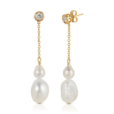We love a good earring that gives us some movement, and the Finley delivers. We'll take pearls on a chain any day, or night.  
 

Genuine freshwater pearls with white CZ stud earrings
14k gold plated over brass, with a layer of protective e-coating
Butterfly back closure

Fulfilled by our friends at Leeada 
*Please Note: This product cannot be shipped outside of the U.S. 
