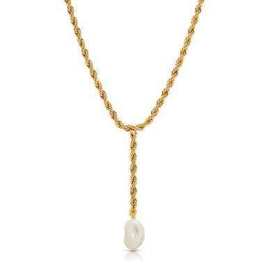 Fulfilled by our friends at Leeada A classic style with a modern sensibility, the gold rope chain and natural mother of pearl bring a sense of elegance and luxury. 
14k gold plated over brass, genuine pearl 
Length: 16" 
Drop: 3" 