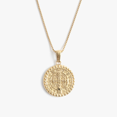 MATERIAL | hypoallergenic + water-resistant + sustainable 
GOLD | 14k gold plated stainless steel 
SILVER | stainless steel 
DETAILS | Reversible St. Benedict iconography pendant - embodies protection against evil 
LENGTH | 18" necklace + 2.5" extender x 1" pendant  
CLOSURE | lobster clasp 
Signature MC jewelry tag for authenticity 
Handmade in USA with love 
Fulfilled by our friends at MARRIN COSTELLO 

Please Note: Rewards cannot be applied to this product 