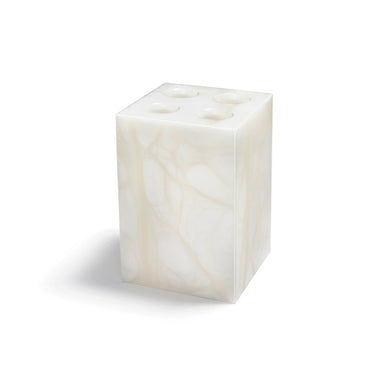   
Inspired by antique tufted cushions, our Tessuto (“Fabric” in Italian) collection combines exotic alabaster with the soft contours of high design. 


Alabaster
Made in Italy
Each toothbrush holder is unique in color, shape and pattern
Wipe clean with damp soft cloth as necessary
3.25" x 3.25" x 4.75"/8cm x 8cm x 12cm

 Healing Properties 
The stone of our Alabaster bathroom collection is thought to be the pure form of transparency. It is believed to prevent tension, to take away headaches, and to enhance concentration. This stone bathroom collection is thought to provide gentle healing, while enhancing the existing decor of your powder room. 
Fulfilled by our friends at ANNA NEW YORK 
*Please Note: This product cannot be shipped outside of the U.S. 