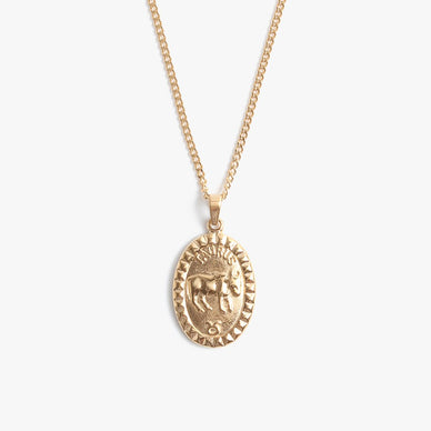Meaning ‘bull’ in Latin, the Taurus is known for its slow and steady perseverance. Represented by the bull’s full form, the Taurus Zodiac Pendant is a beautiful symbol of strength and spirit. Surrounded by our signature MC Melrose studded border, the Taurus name and earth sign design is accompanied by its respective glyph motif of a circle with two curved triangular horns on top. A gorgeous ovular pendant hung from a delicate curb link chain, this 16” necklace comes complete with a 2” extender — giving you all the layering options in one hypoallergenic and water resistant piece that you can put on and never take off. A favorite necklace to gift to others — we highly recommend pairing the Taurus Pendant with our Taurus Print for the complete birthday set. 

April 20 - May 20 
16" length, 1" extender 
0.5" pendant
 Fulfilled by our friends at MARRIN COSTELLO

Please Note: Rewards cannot be applied to this product
